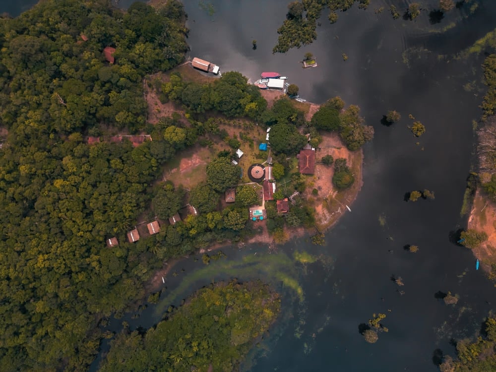 Aerial view of Amazon Turtle Lodge located by the river and deep inside the Brazilian Amazon rainforest.