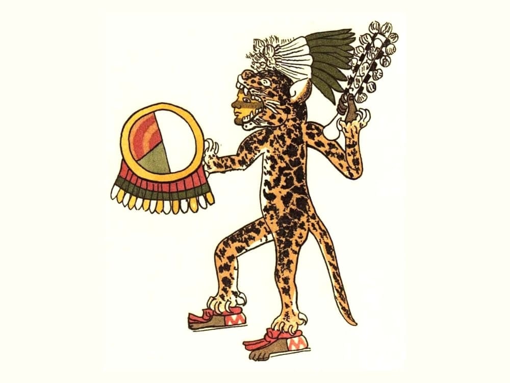 Un'illustrazione mesoamericana d'epoca che raffigura una figura vestita da guerriero giaguaro, con scudo e copricapo. Un'illustrazione mesoamericana d'epoca che raffigura una figura vestita da guerriero giaguaro, con scudo e copricapo.