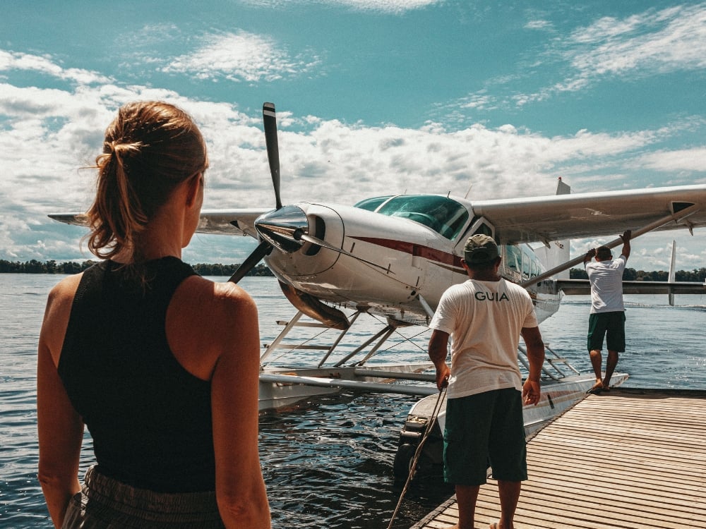 Seaplane docked at a river pier in Manaus, a common transport method to reach remote Amazon jungle lodges and explore nature. Seaplane docked at a river pier in Manaus, a common transport method to reach remote Amazon jungle lodges and explore nature.